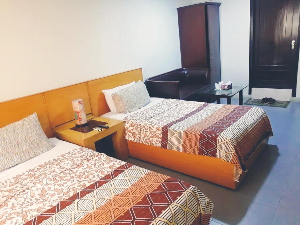 Hotel Rooms Dha 卡拉奇 客房 照片