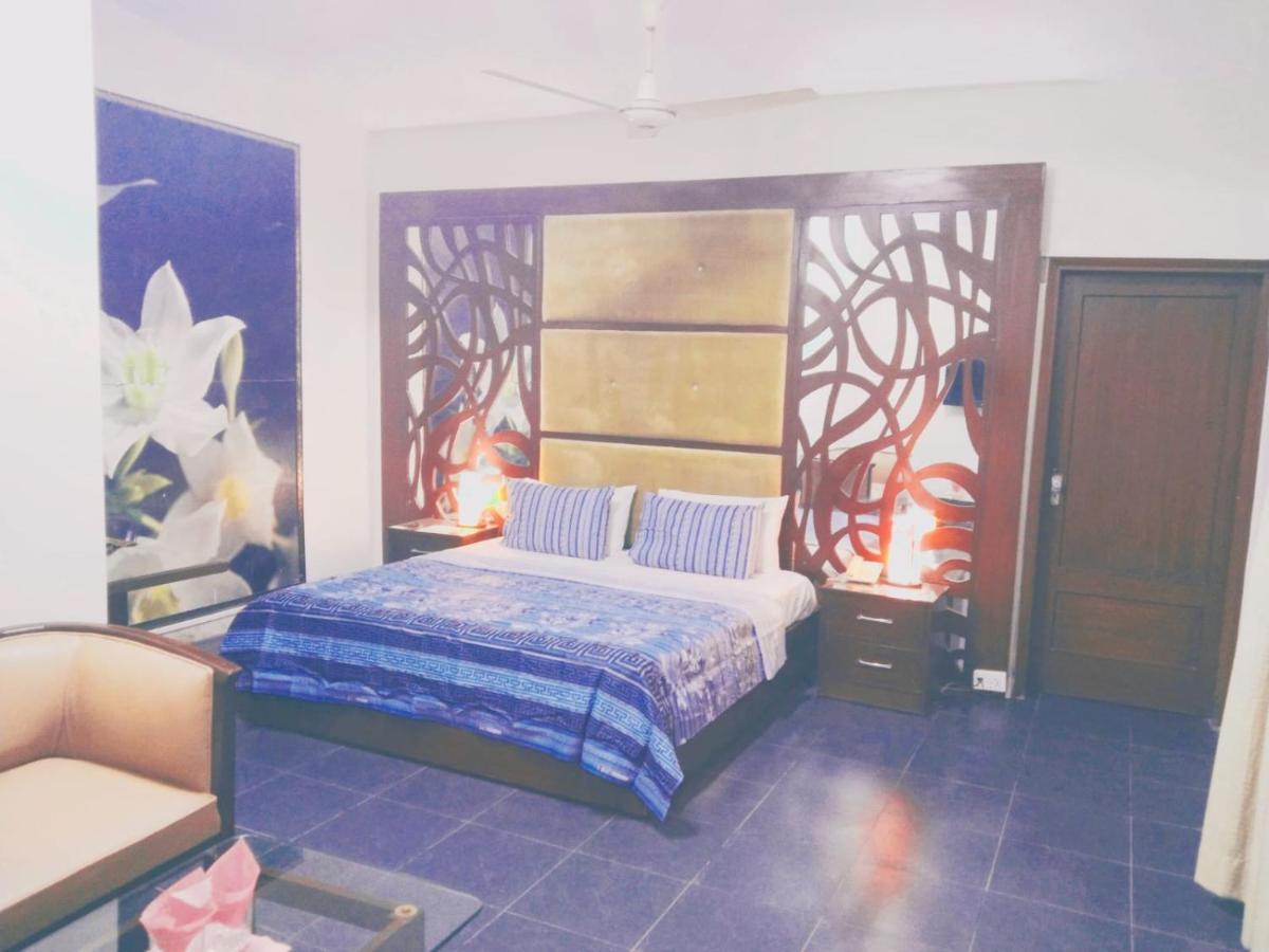 Hotel Rooms Dha 卡拉奇 客房 照片