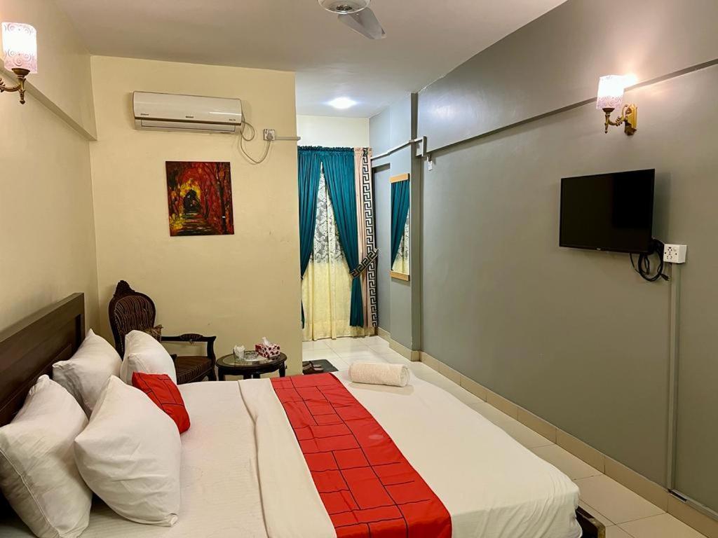 Hotel Rooms Dha 卡拉奇 外观 照片