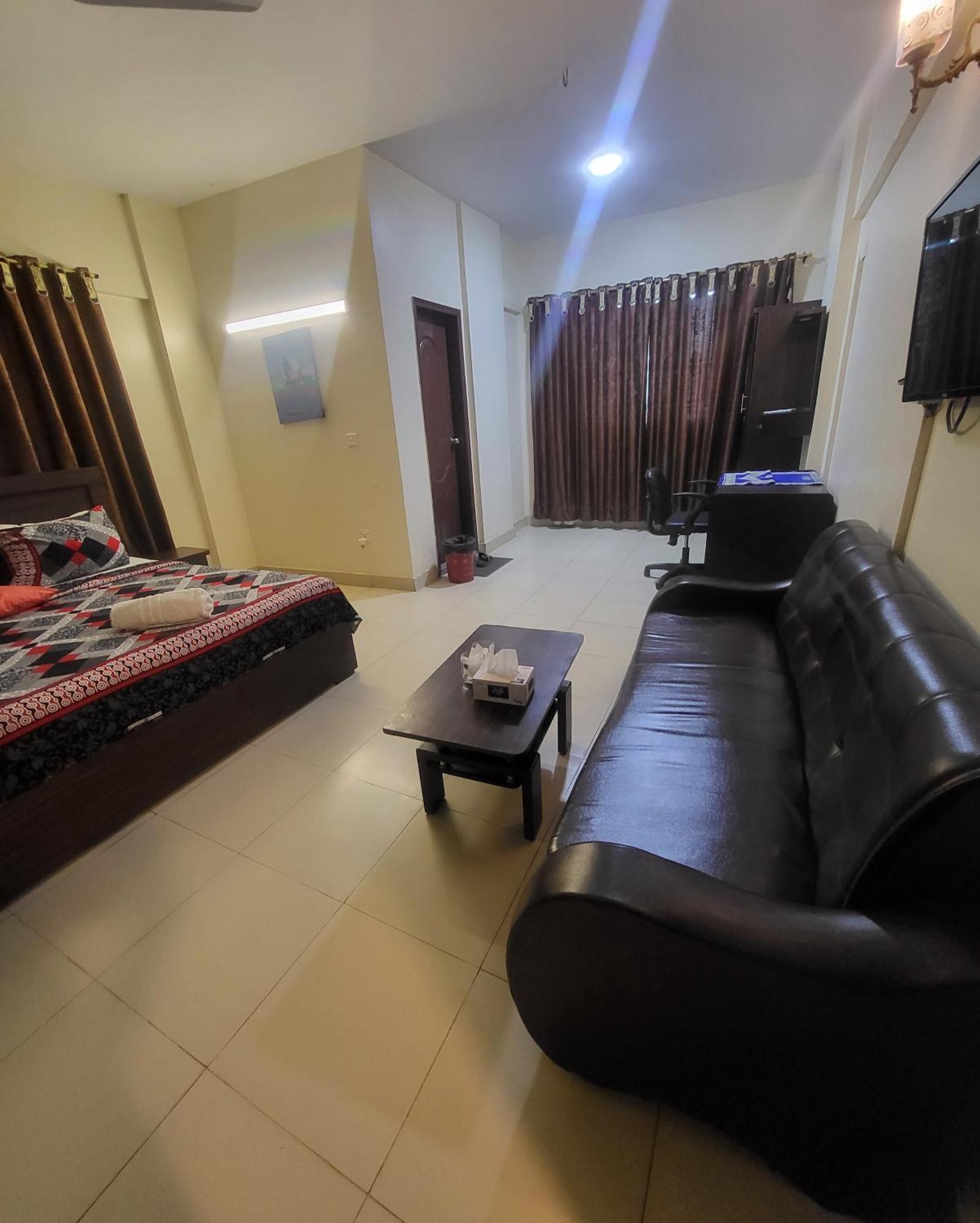 Hotel Rooms Dha 卡拉奇 外观 照片