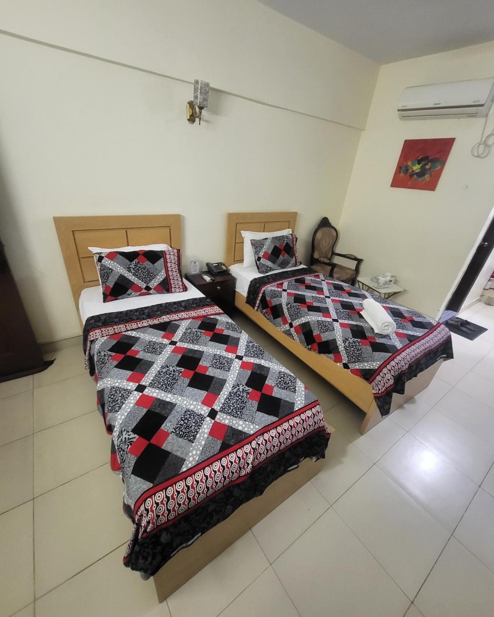 Hotel Rooms Dha 卡拉奇 外观 照片